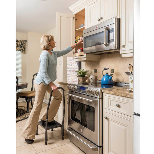 Drive footstool with handrail